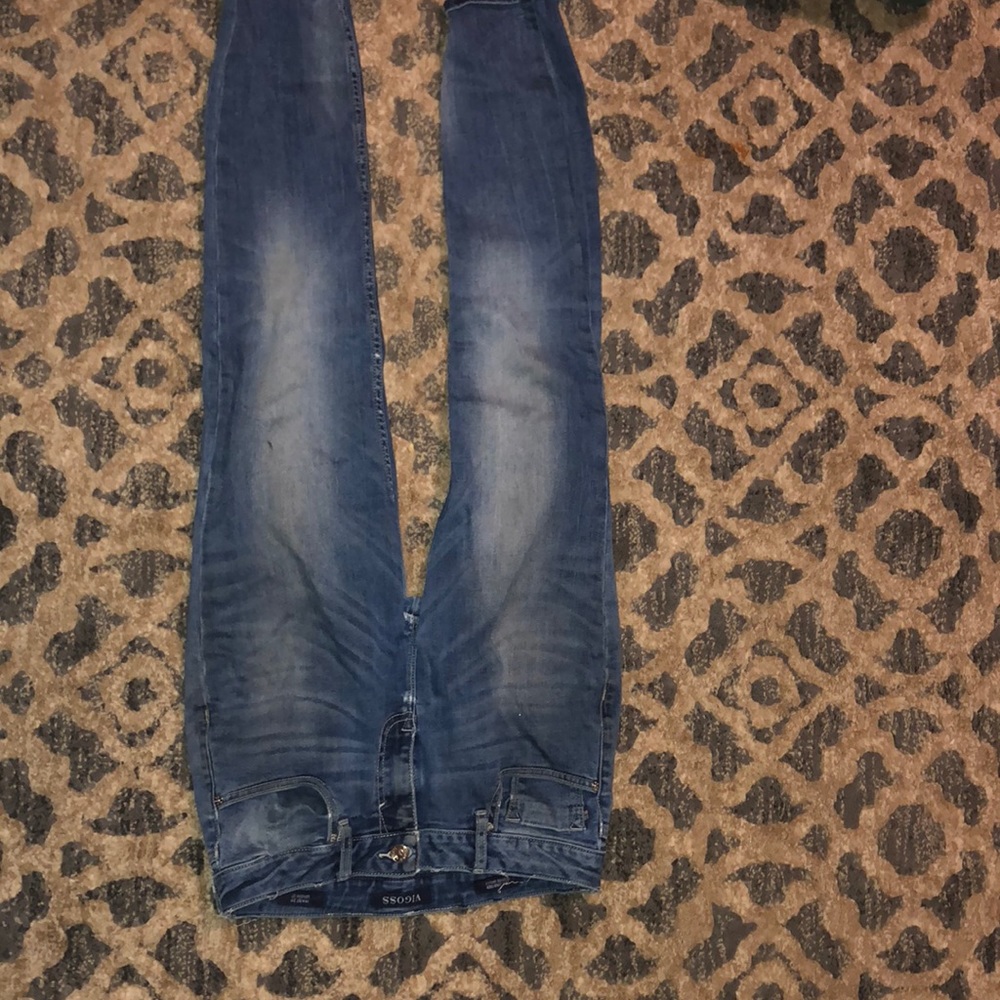 Distressed vigoss jeans.